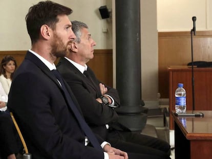 Leo Messi and his father, Jorge Horacio Messi, in court in Barcelona.