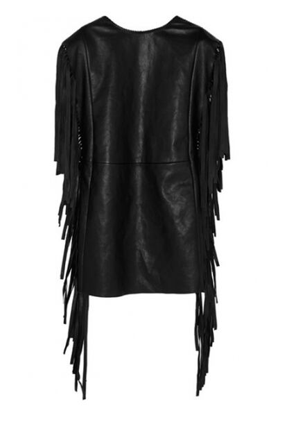 Vestido negro de piel con flecos de Saint Laurent (2.690 euros).