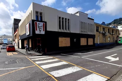A KFC restaurant is boarded up with plywood ahead of the arrival of Hurricane Beryl in Kingstown, St. Vincent and the Grenadines June 30, 2024 in a still image from video.