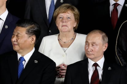 Angela Merkel, detrás de Vladimir Putin y Xi Jinping durante el G20