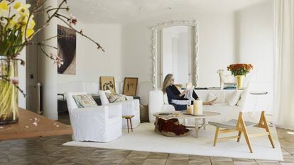 Ana Viladomiu in her living room in Gaudi’s La Pedrera building in Barcelona.