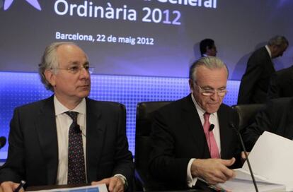 El director General de La Caixa, Juan María Nin (i) y el presidente de La Caixa, Isidre Fainé (d), durante la asamblea general ordinaria celebrada en Barcelona.