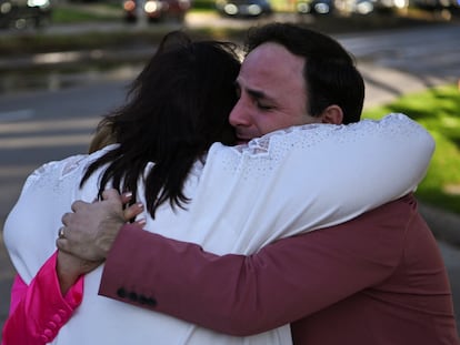 Carlos Gonzalez, a worship singer, hugs a fellow churchgoer after a shooting incident at television evangelist Joel Osteen's Lakewood Church in Houston, Texas, U.S. February 11, 2024.
