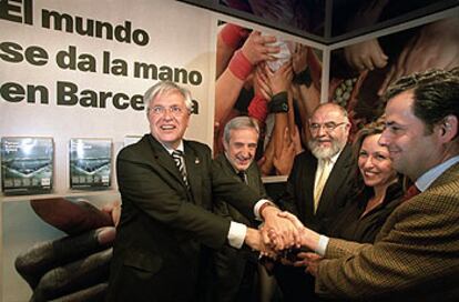 De izquierda a derecha, Joan Clos, Lluís Reverter, Jaume Pagés y Trinidad Jiménez, en la exposición sobre el Fòrum.