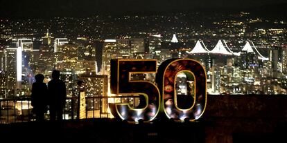 A Super Bowl 50 sign stands in a park overlooking San Francisco Wednesday, Feb. 3, 2016. The Denver Broncos play the Carolina Panthers in the NFL Super Bowl 50 football game Sunday, Feb. 7, 2015, in Santa Clara, Calif. (AP Photo/Charlie Riedel) 