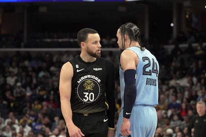 Memphis Grizzlies Forward Dillon Brooks (24) and Golden State Warriors guard Stephen Curry (30) have words in the first half of an NBA basketball game Saturday, March 18, 2023, in Memphis, Tenn.