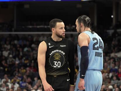 Memphis Grizzlies Forward Dillon Brooks (24) and Golden State Warriors guard Stephen Curry (30) have words in the first half of an NBA basketball game Saturday, March 18, 2023, in Memphis, Tenn.