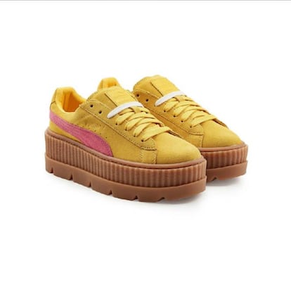 Rihanna y Puma anunciaron planes de trabajo conjunto a finales de 2014, saliendo a la venta el primer modelo de la colaboración un año más tarde. El resultado fueron las Creeper Suede, que pasaron a convertirse en la “zapatilla del año”, un reconocimiento otorgado por Footwear News, y cuyo éxito también se reflejó en un aumento de las ventas generales de la marca. Este verano de 2017, Puma ha añadido a esa clásica silueta (que ya presentaba una mediasuela con bastante altura) otra suela más, de tipo bota, aumentando los centímetros de la misma y de la persona que las lleve. Este nuevo modelo, con su color carmín y limón, está a la altura del 'glamour' que transmite Rihanna.