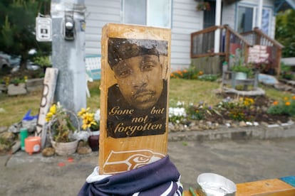 A sign is displayed on May 27, 2021, at a memorial in Tacoma, Wash., where Manuel "Manny" Ellis died March 3, 2020, after he was restrained by police officers.