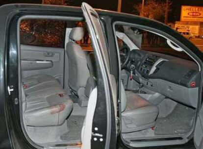 El coche de los turistas, después de ser tiroteado por la policía en Fortaleza, Brasil.