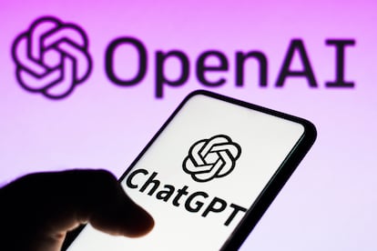 In this photo illustration, the ChatGPT logo is seen displayed on a smartphone and the OpenAI company logo on background
