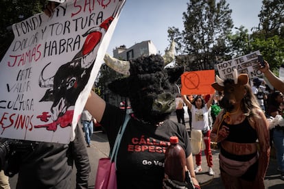 Hundreds of people demonstrate outside a bullring in Mexico City during a bullfight on January 28.