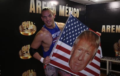 Sam Adonis shows off his Trump flag.