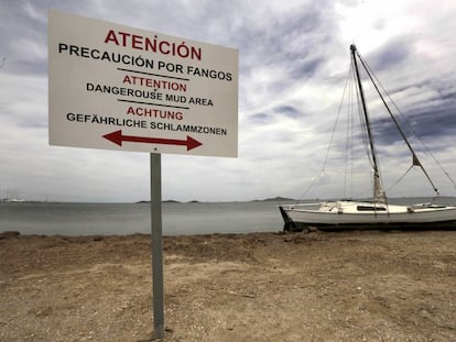 Warning signs on a beach in Murcia.