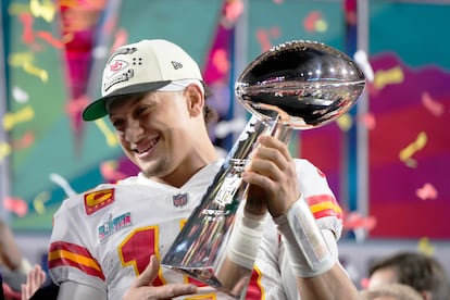 Kansas City Chiefs quarterback Patrick Mahomes (15) holds the trophy after their win against the Philadelphia Eagles in the NFL Super Bowl LVII.