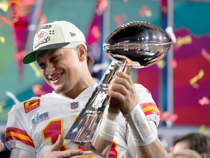 Kansas City Chiefs quarterback Patrick Mahomes (15) holds the trophy after their win against the Philadelphia Eagles in the NFL Super Bowl LVII.