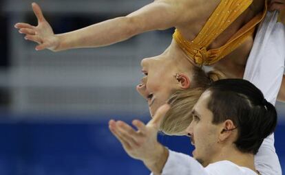 Tatiana Volosozhar y Maxim Trankov durante la prueba.