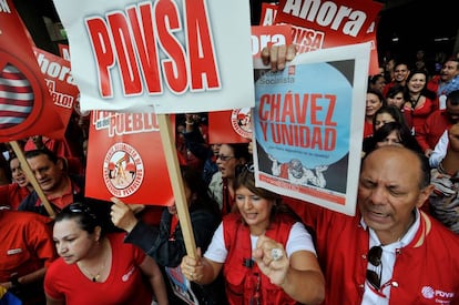 Venezuelan state oil firm (PDVSA) workers show support for Hugo Chávez in May 2011.