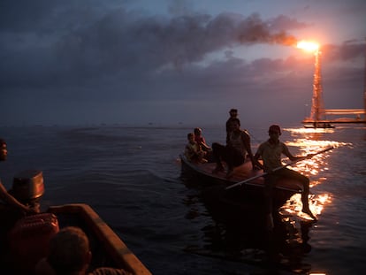 Fishermen near a PDVSA oil rig in Lake Maracaibo, Venezuela, in May of 2019.