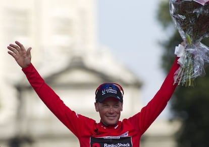 RadioShack&#039;s US rider Chris Horner celebrates on the podium after winning the &quot;Vuelta&quot; Tour of Spain in Madrid on September 15.