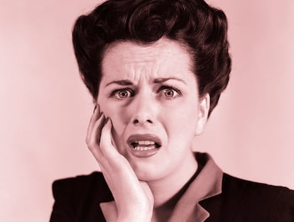 1940s portrait of woman with shocked expression looking at camera
