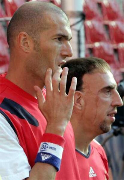 Zidane, junto a Ribéry.