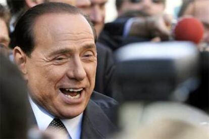 Silvio Berlusconi, a la salida de su intervención ante la confederación de comerciantes de Italia.