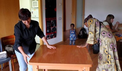 Members of the families who live in the property, in one of the communal areas.