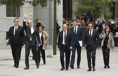 Former deputies in the Catalan regional government arrive at the Spanish High Court.