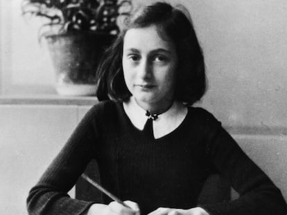 Anne Frank, doing homework aged 12 in 1941.