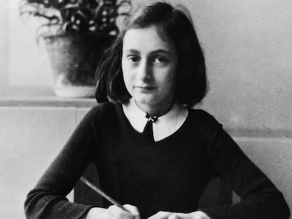 Anne Frank, doing homework aged 12 in 1941.