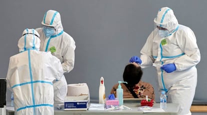 Health workers perform PCR tests in Girona province.