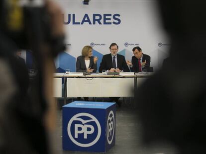 Rajoy, Cospedal y Maillo, este lunes en un acto del PP.