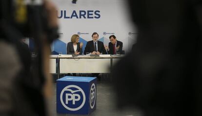 Rajoy, Cospedal y Maillo, este lunes en un acto del PP.