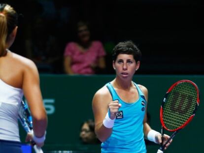 Muguruza y Carla, durante un partido en Singapur.