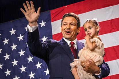 Republican gubernatorial candidate for Florida Ron DeSantis holds his daughter Mamie during an election night watch party at the Convention Center in Tampa, Florida.