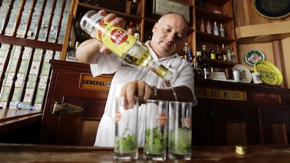 A bartender prepares mojitos with Havana Club rum in the Cuban capital.