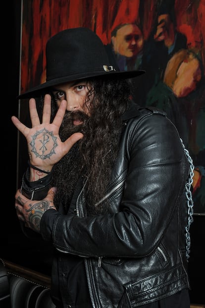 Singer Dave Parley of the rock and roll band “Prayers” poses for a portrait showing his hand tattoo at a portrait session in their studio on January 14, 2018 in Los Angeles, California.