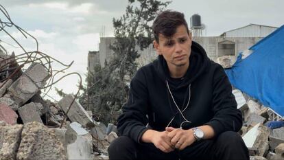 Aws Al-Banna, seated among the ruins of the building where his fiancée Natalie once lived, in a scene from his short ‘Jad and Natalie.’