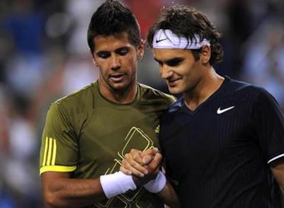 Fernando Verdasco y Roger Federer, tras su partido.