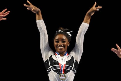 Simone Biles poses during the awards ceremony after winning the all-around of the Core Hydration Classic at NOW Arena in Hoffman Estates, Illinois, U.S. August 5, 2023.