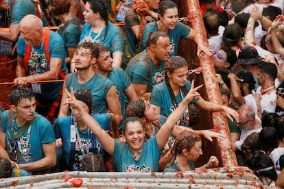 A reveler gestures during the annual "La Tomatina" food fight festival in Bunol, Spain, August 30, 2023. REUTERS/Eva Manez