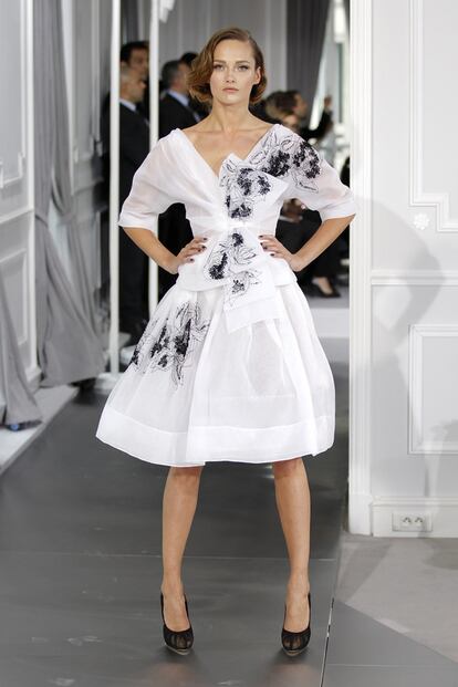A model presents a creation by designer Bill Gaytten as part of his Haute Couture Spring-Summer 2012 fashion show for French house Dior in Paris
