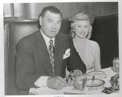 The young Joan Olander, who had not yet changed her name to Mamie Van Doren, with her then-fiancé, former world heavyweight boxing champion Jack Dempsey.