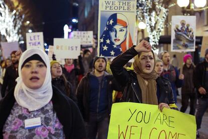 Protesta contra el decreto de Donald Trump por las calles de Seatle.