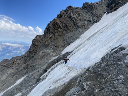 A climber traverses the bowling alley on the way to the summit of Mont Blanc.