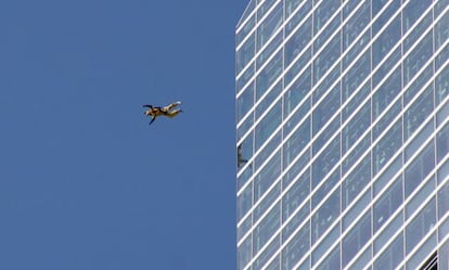 The BASE jumper known as El Amarillo jumps from the Torre de Cristal in Madrid, Spain&#039;s highest building.