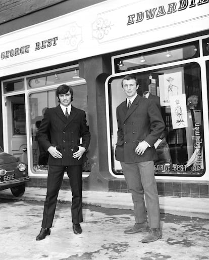 George Best with soccer player Mike Summerbee at the opening of their boutique in Manchester.