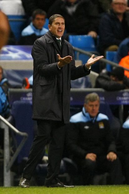 Juan Carlos Garrido gestures on the touchline during a match.