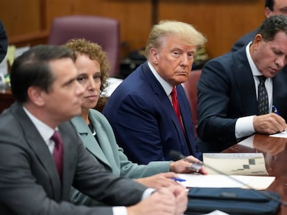 Former President Donald Trump sits at the defense table with his legal team in a Manhattan court, on April 4, 2023, in New York.